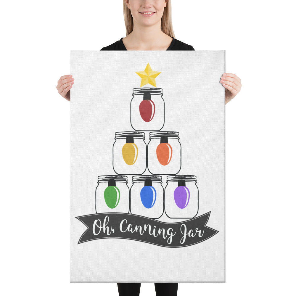 A woman holding up a poster that says The Purposeful Pantry Oh Canning Jar Christmas Wall Art.