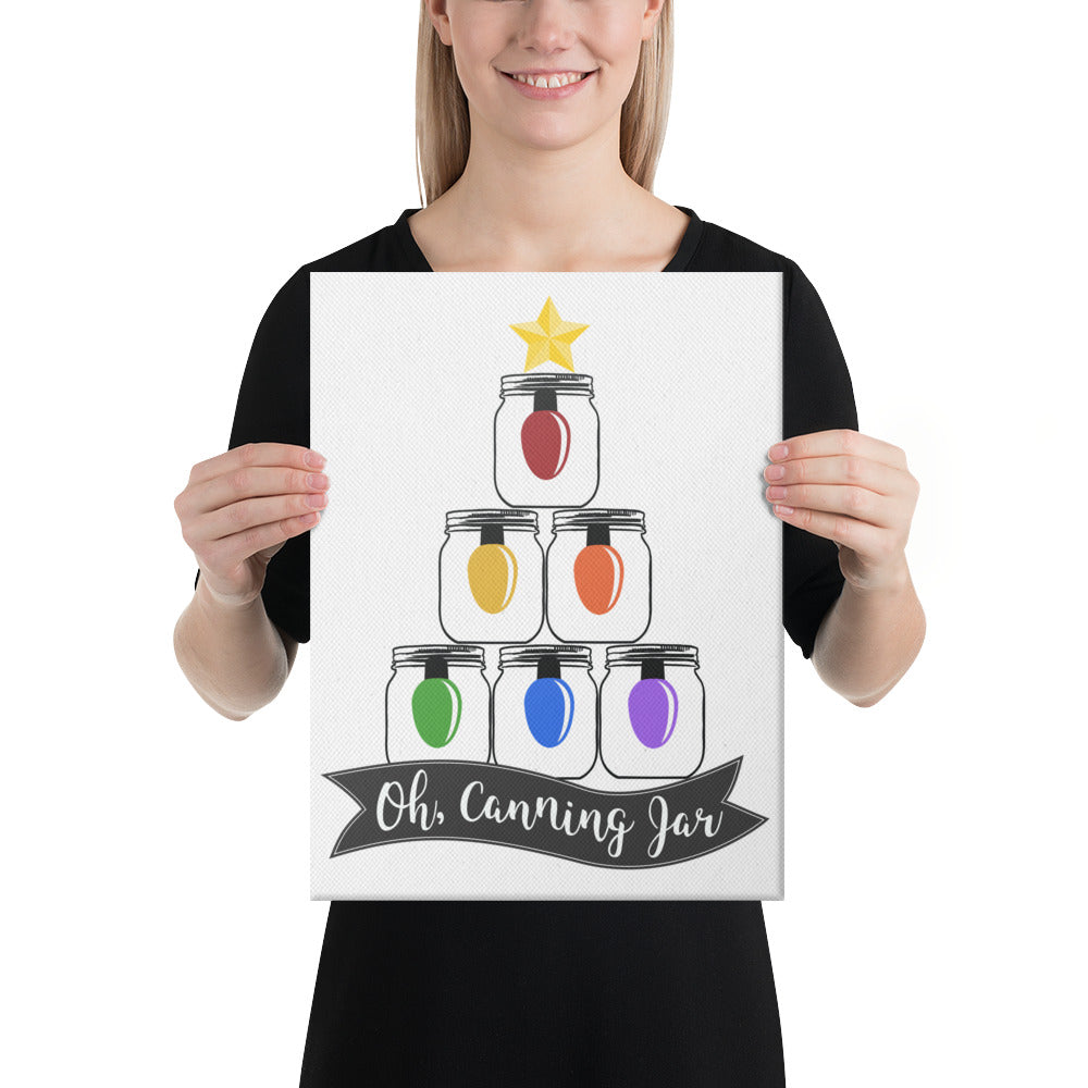 A woman holding up a poster that says Oh Canning Jar Christmas Wall Art by The Purposeful Pantry.