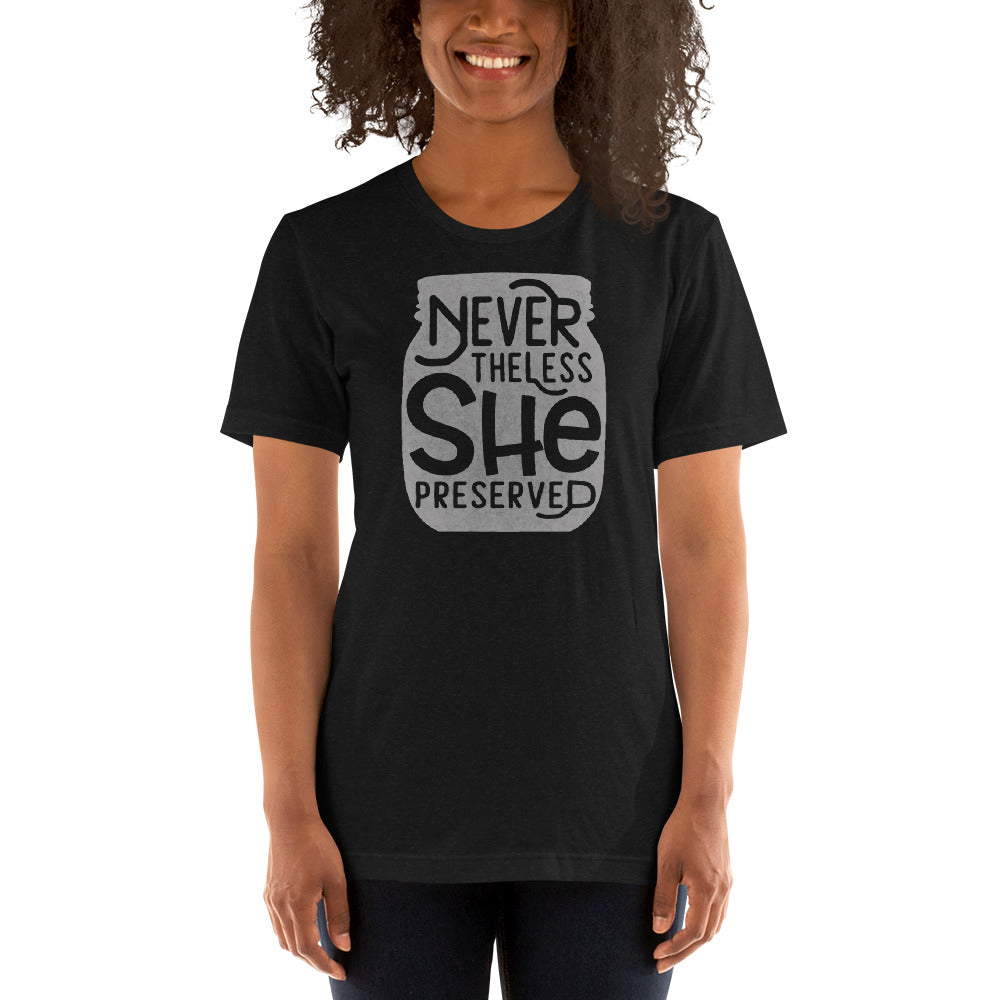 A woman wearing a black Nevertheless She Preserved Short Sleeved T-Shirt from The Purposeful Pantry brand that says neverless she is appreciated.